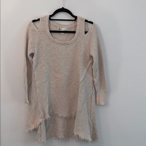 Cream sweater with shoulder cutouts